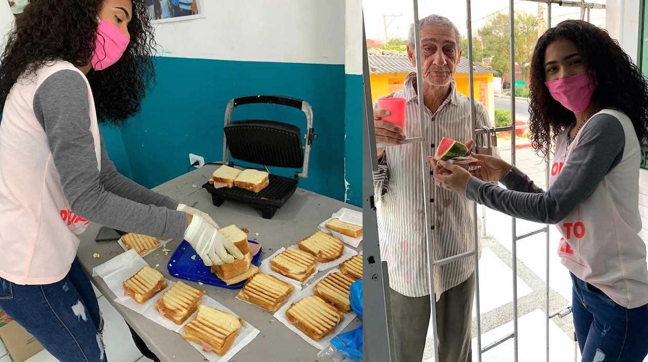 Melanee Cantillo durante la preparación y entrega de los alimentos.