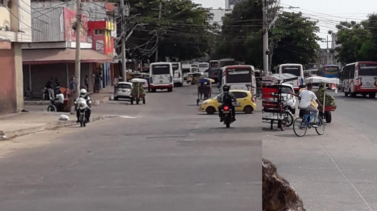 Buses de las dos empresas en la carrera 38 entre calles 33 y 35.