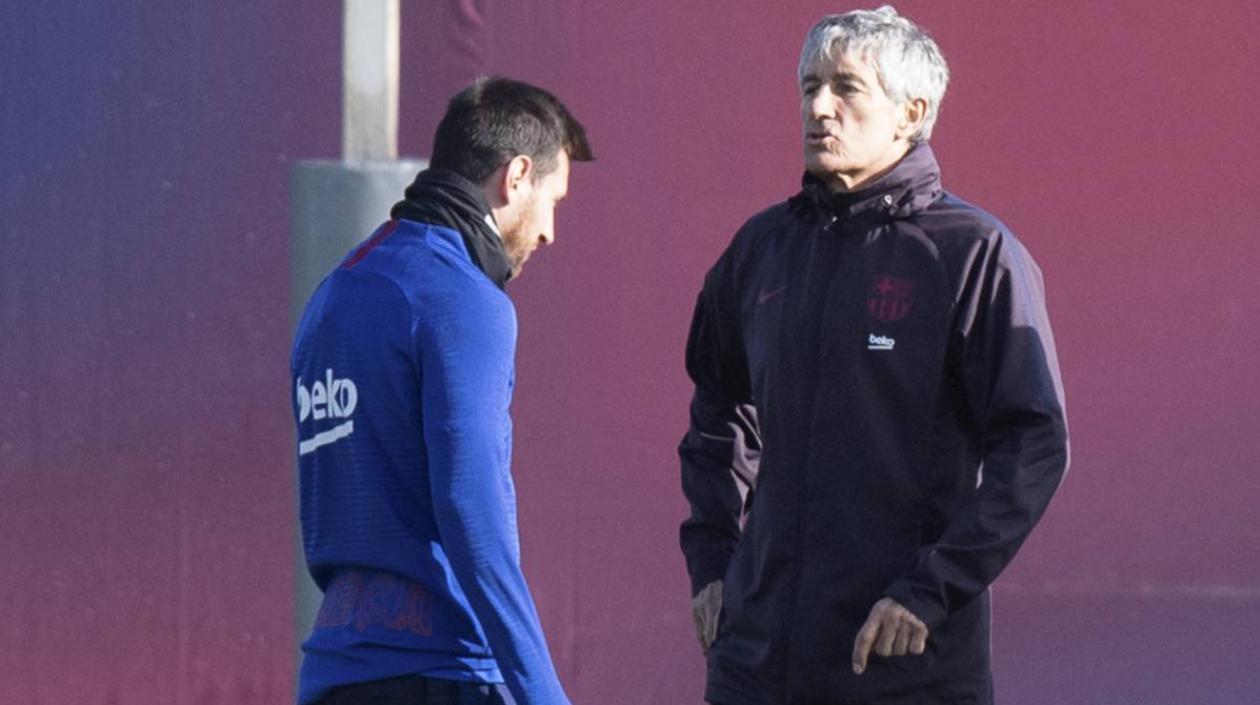 Lionel Messi y Quique Setién.