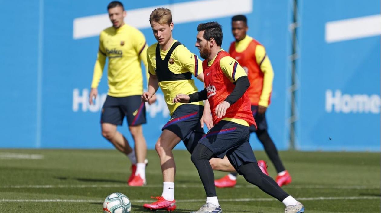 Frenkie De Jong y Lionel Messi, en un entrenamiento.