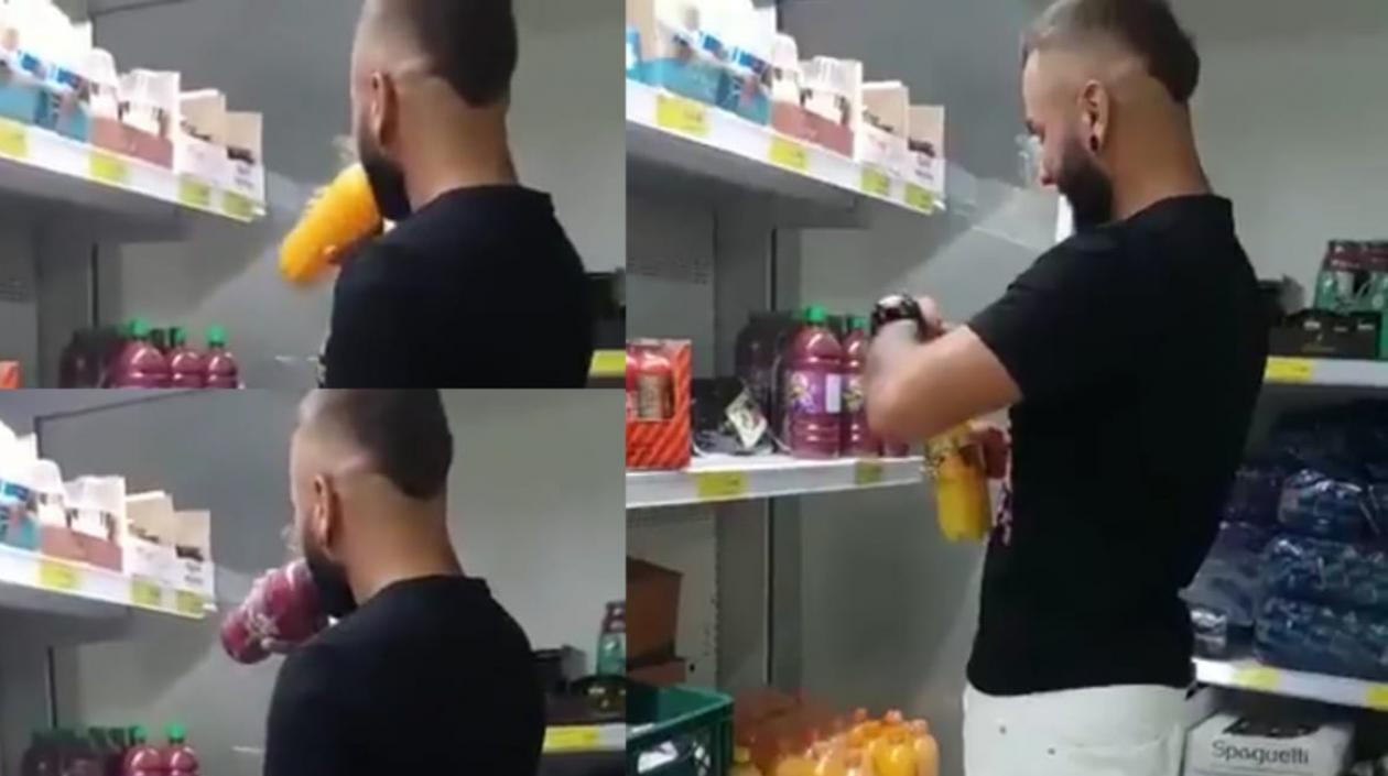 Momento en el que abre y bebe de las tres botellas de jugo.