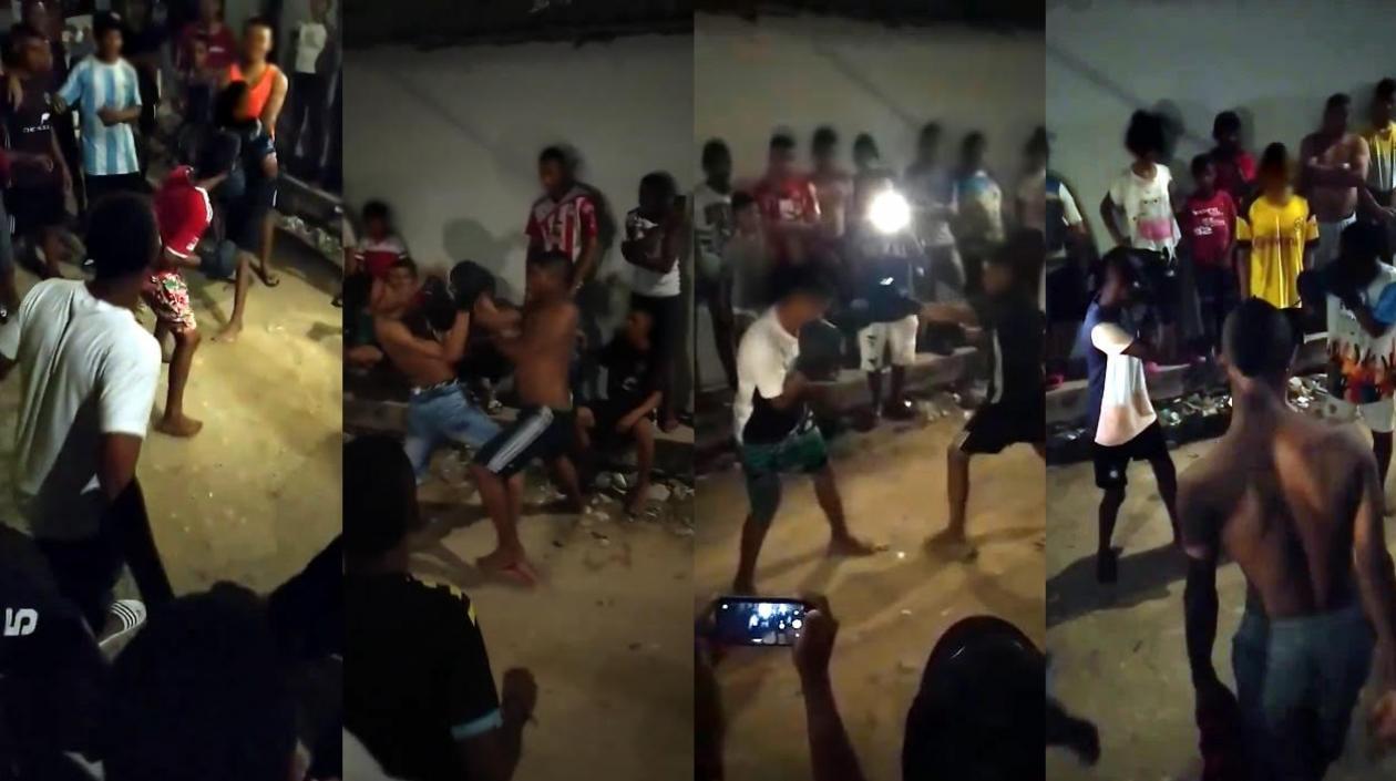 Niños boxeando en en el barrio La Chinita.