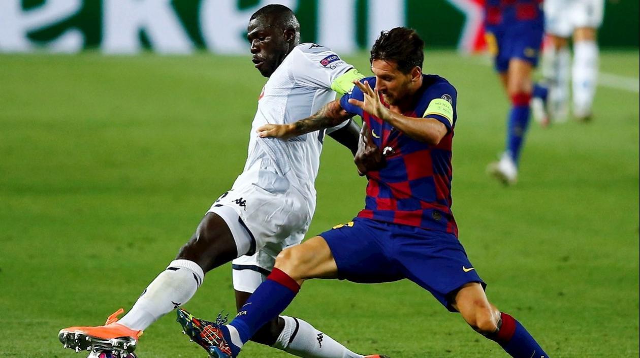 Kalidou Koulibaly y Lionel Messi.