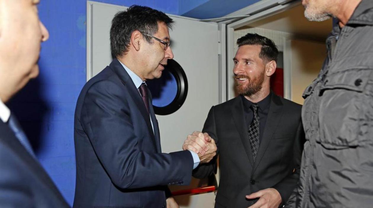 Josep Maria Bartomeu y Lionel Messi.