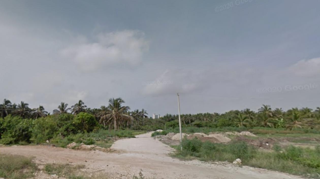 En este sector de La Loma, al fondo, fueron hallados los cuerpos en una vivienda.