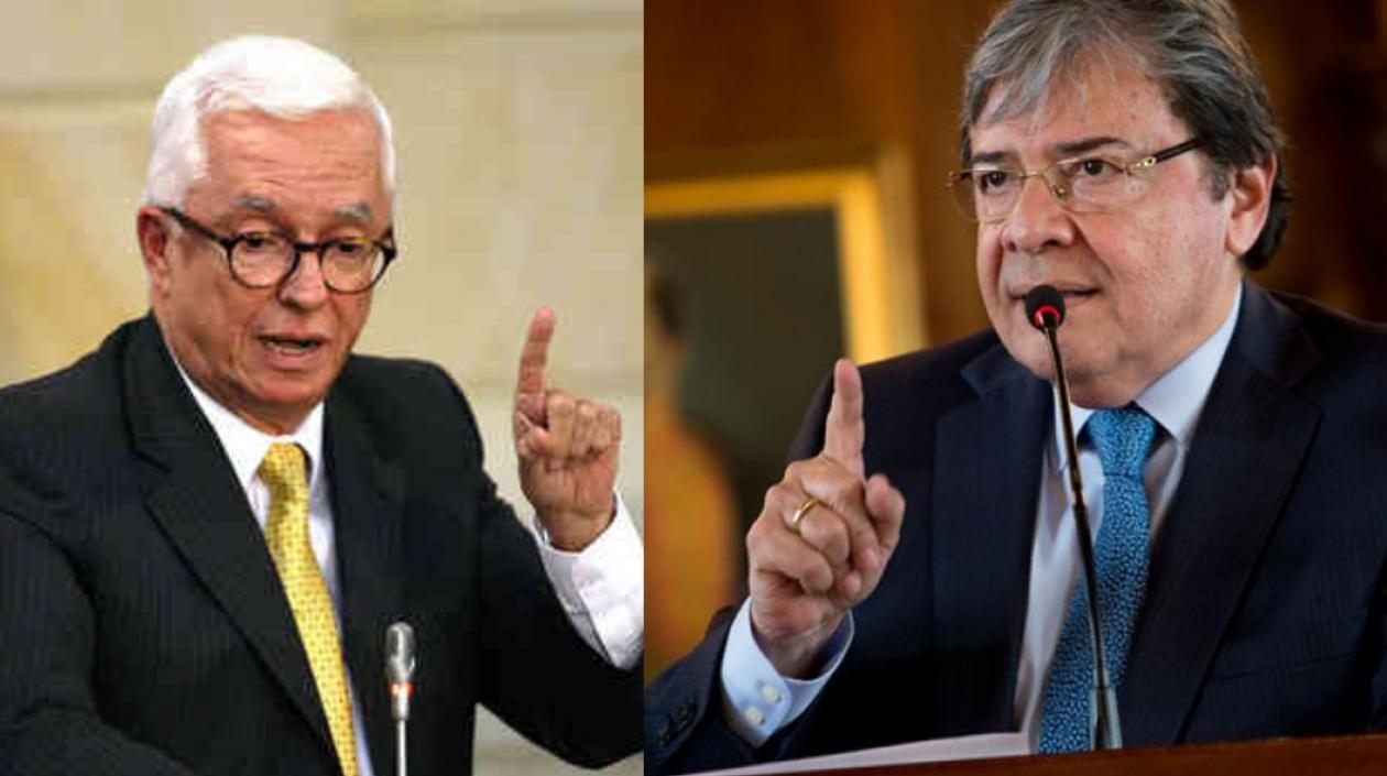 A la izquierda, Jorge Robledo, congresista. A la derecha el ministro de Defensa, Carlos Holmes Trujillo.