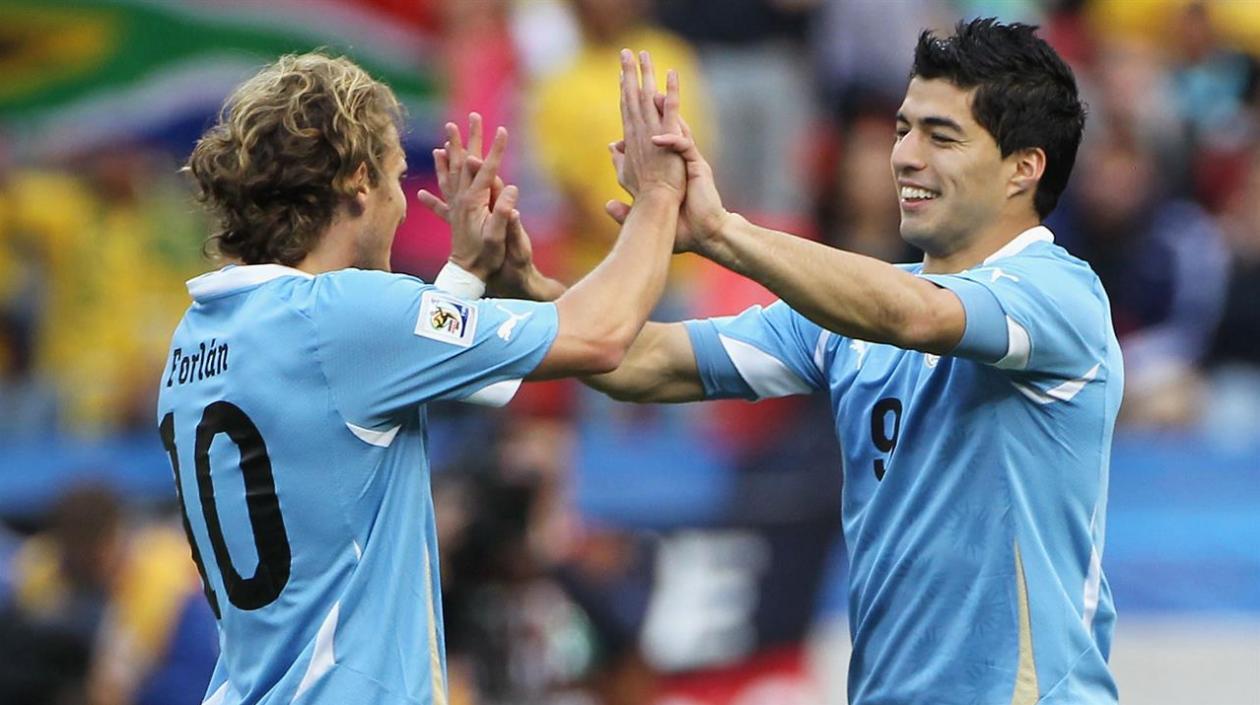 Diego Forlan y Luis Suárez. 