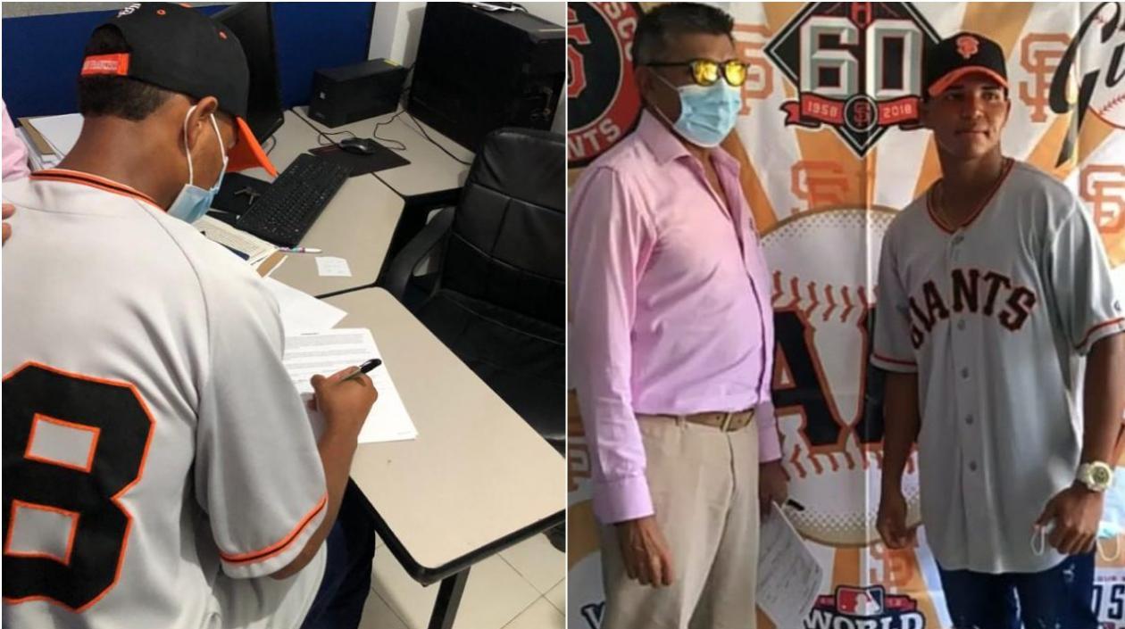 Ángel Mauricio Polo firma su contrato con los Gigantes y posa al lado del scout Daniel Mavarez.