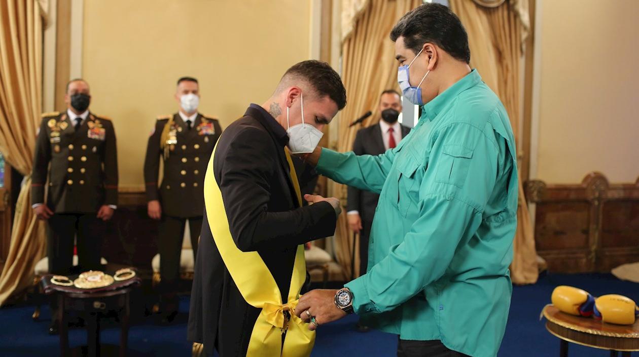 Roger Gutiérrez y Nicolás Maduro. 