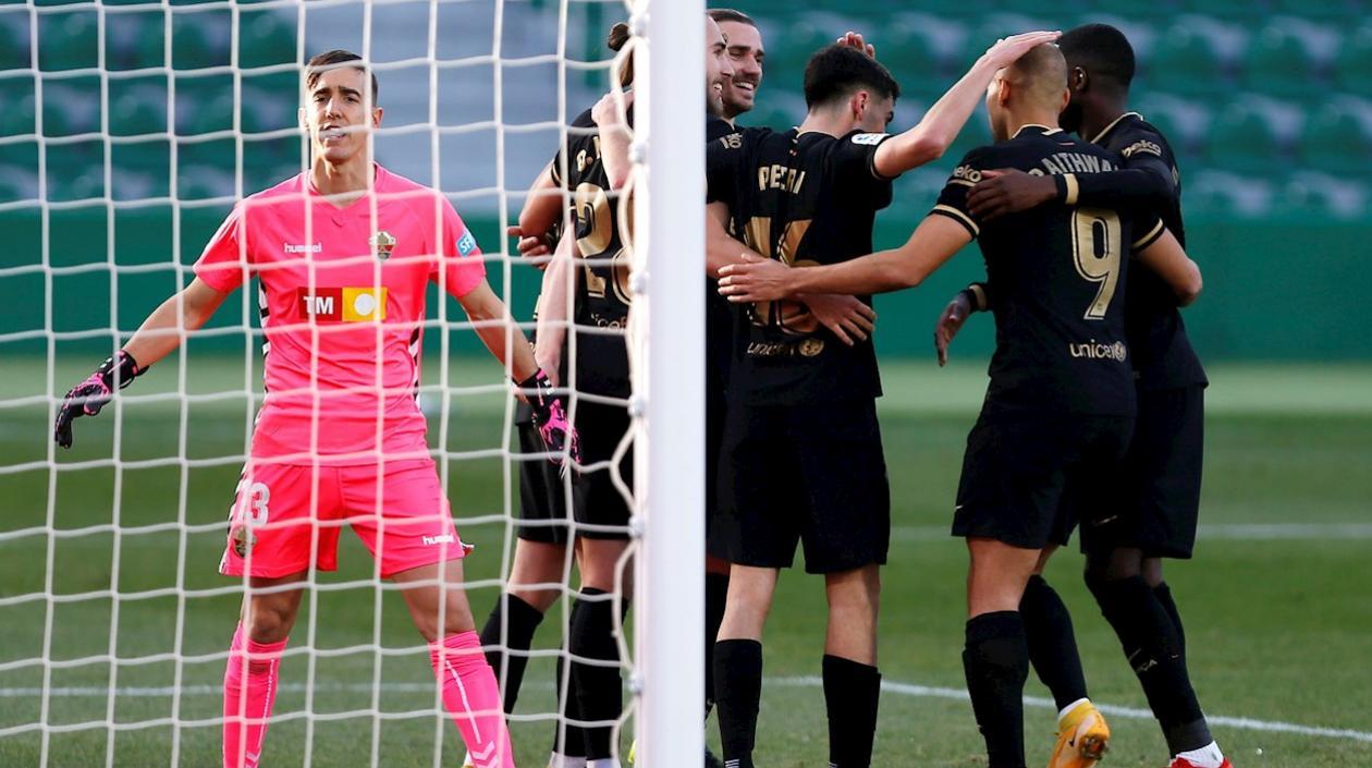 Los jugadores del Barça celebran la anotación. 