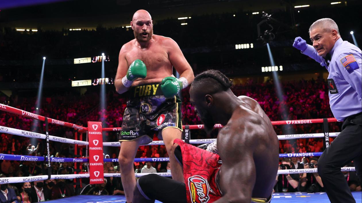 Tyson Fury y Deontay Wilder.