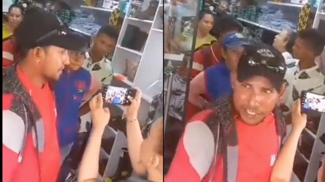 El niño y el joven (atrás) antes de ser asesinados.