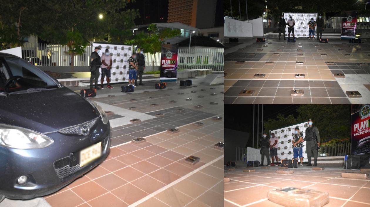 La cocaína y los dos capturados por la Policía. 