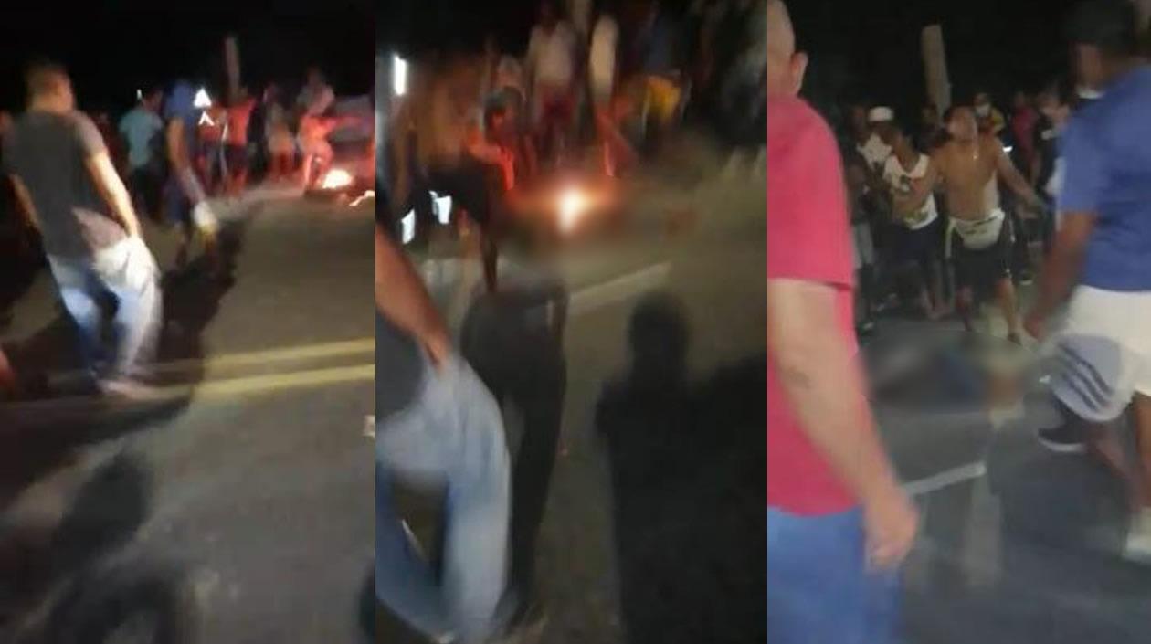 Momento en que al hombre le prendieron fuego.