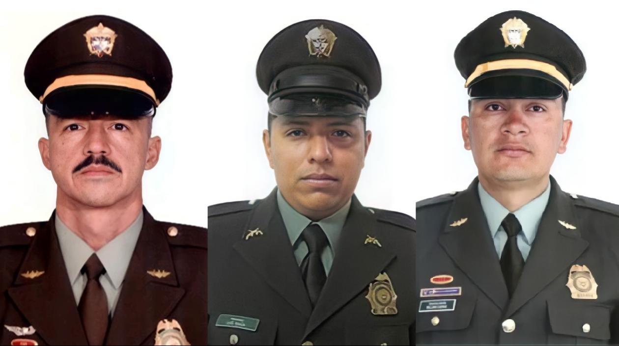 Los tres policías fallecidos. 