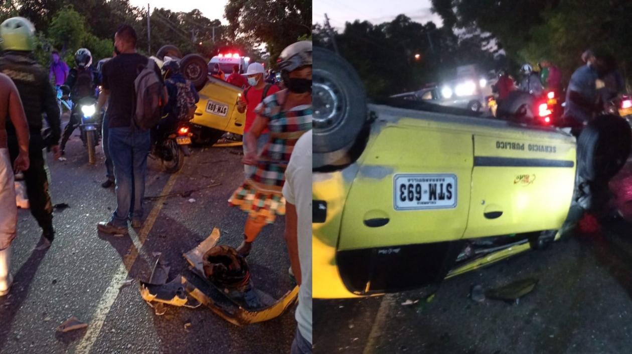 El taxi volcado tras el accidente. 