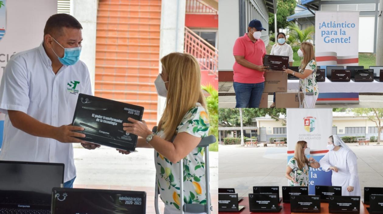 Gobernadora Elsa Noguera entregando los portátiles.