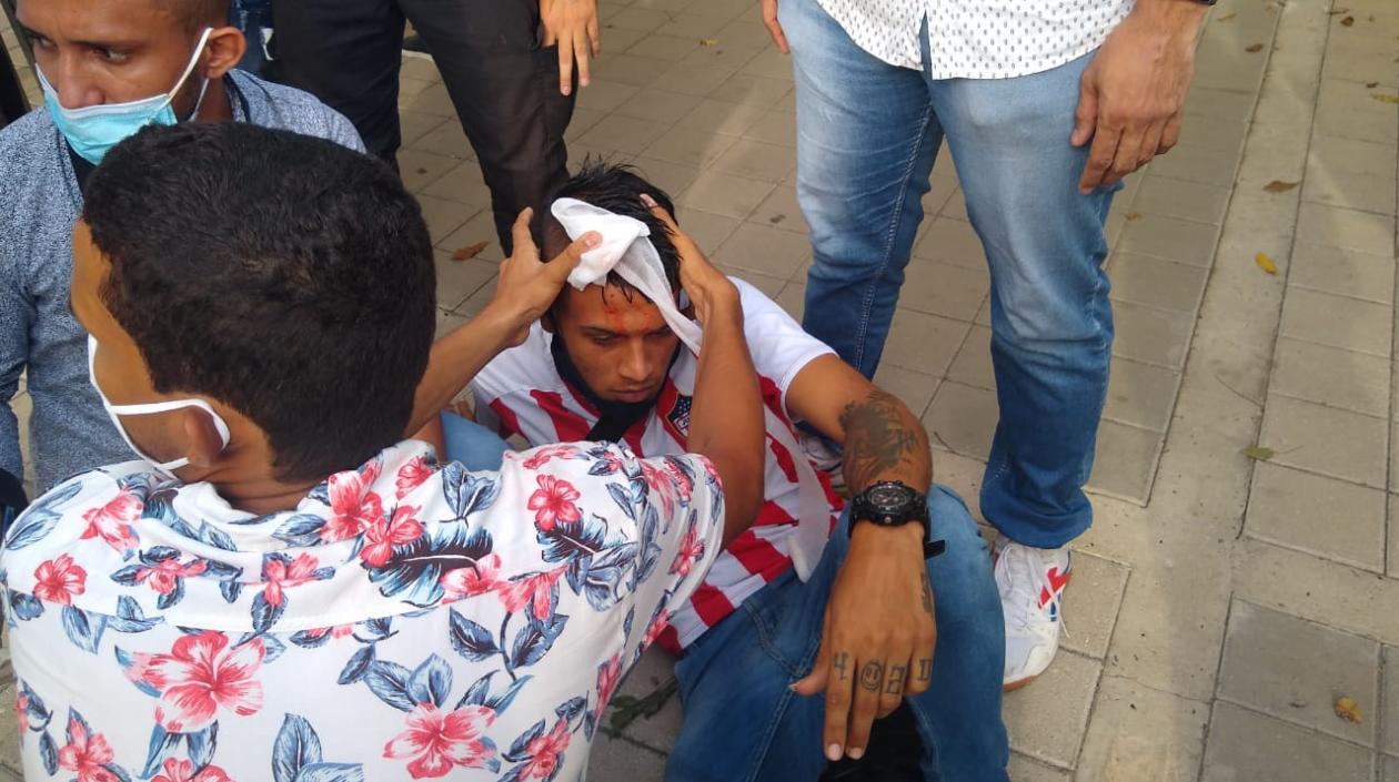 El joven herido por la piedra.