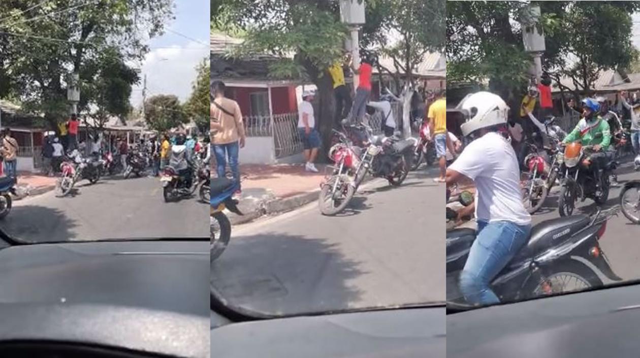 Momento en que era vandalizado la cámara de 'foto-multa'. 