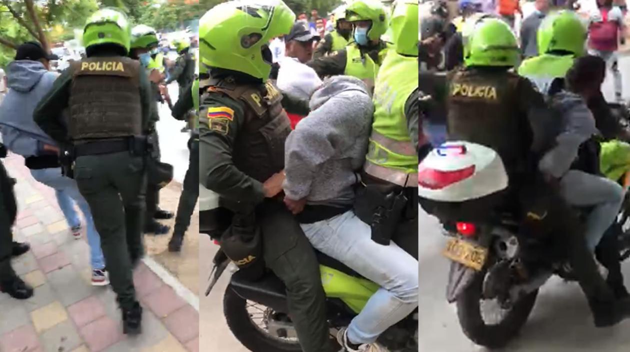 La Policía cuando capturaba a uno de los presuntos implicados en el crimen.