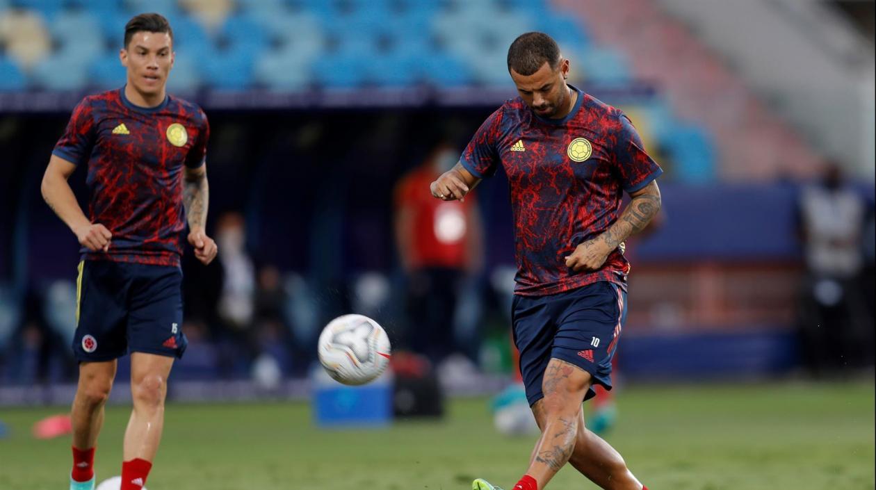 Edwin Cardona y Matheus Uribe, durante un calentamiento. 