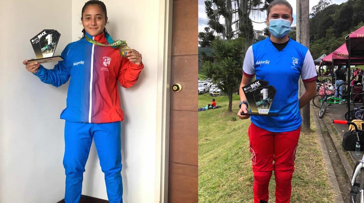 Sharid Fayad y Gabriela Bolle exhibiendo los trofeos.