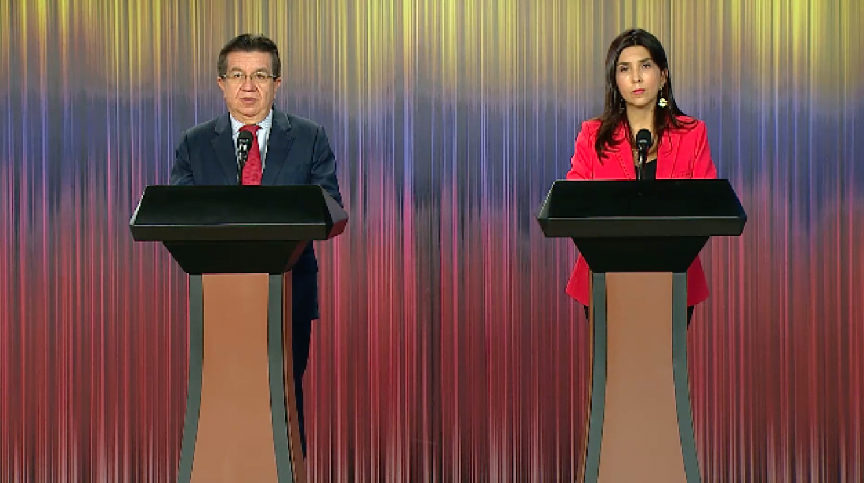 Ministro de Salud, Fernando Ruiz, y ministra de Educación, María Victoria Angulo.