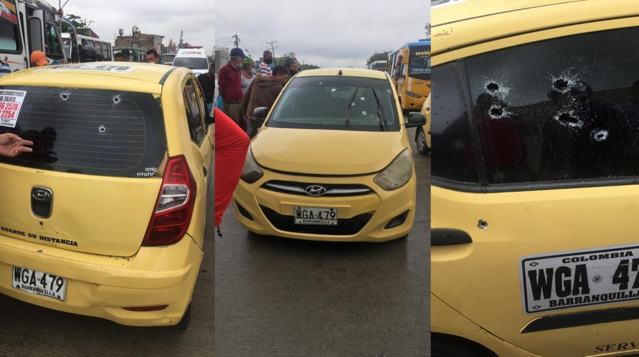 Así quedó el taxi tras ser impactado a bala. 