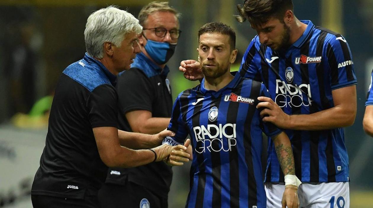 Gian Piero Gasperini y 'Papu' Gómez. 