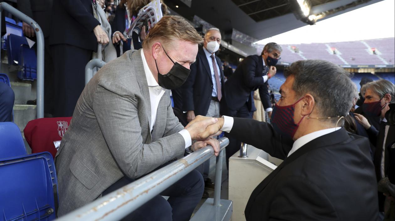 Ronald Koeman y Joan Laporta.