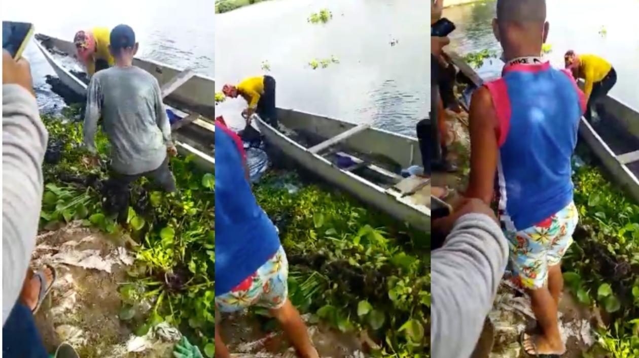 Momento en que el cuerpo del menor era sacado del agua. 