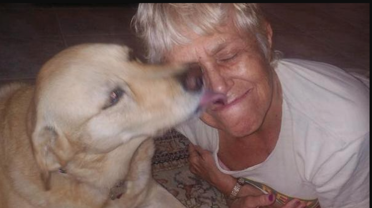 El perro y su dueña Suzan Marciano.