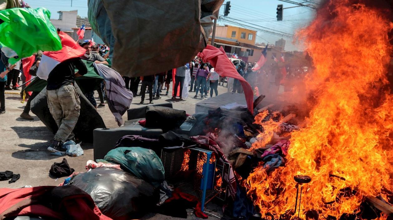 Los hechos ocurrieron en la ciudad de Iquique, ubicada en la costa norte del país, donde esta mañana se desplegó una marcha "antimigración". 