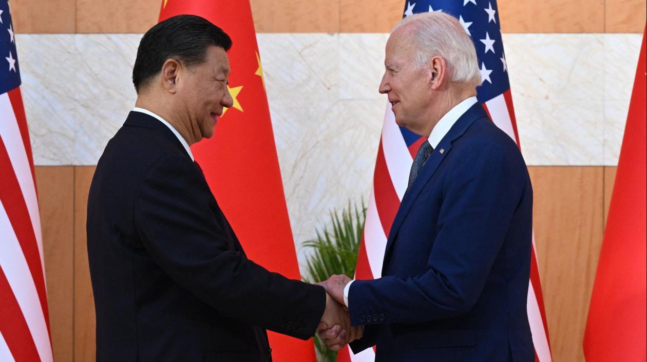 Xi Jinping y Joe Biden.