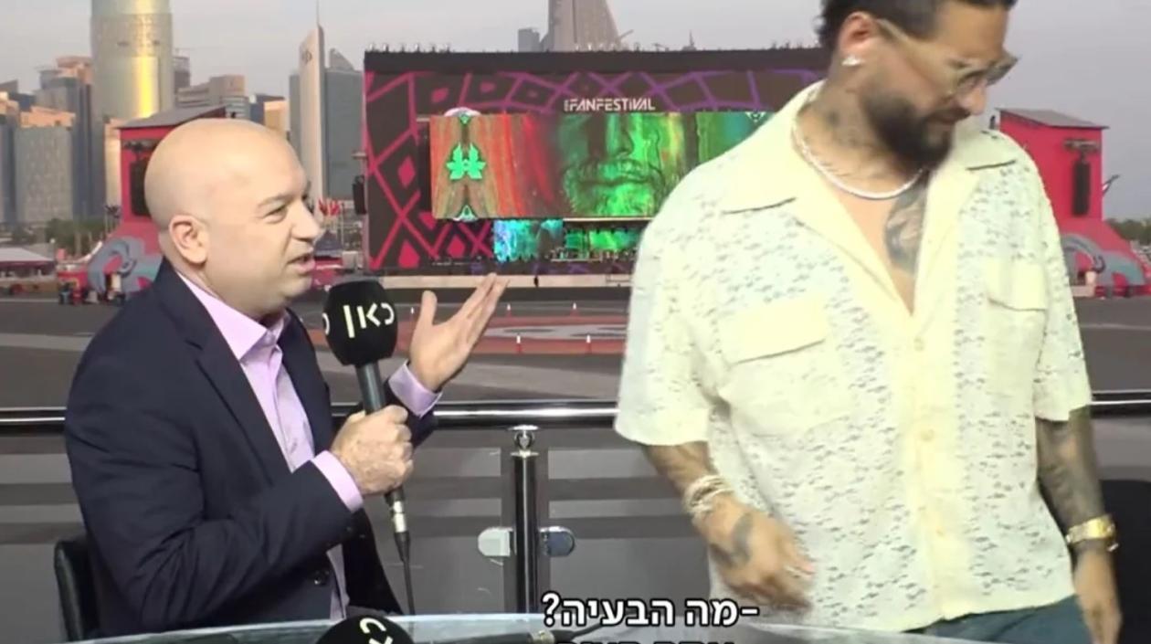 Periodista y Maluma.