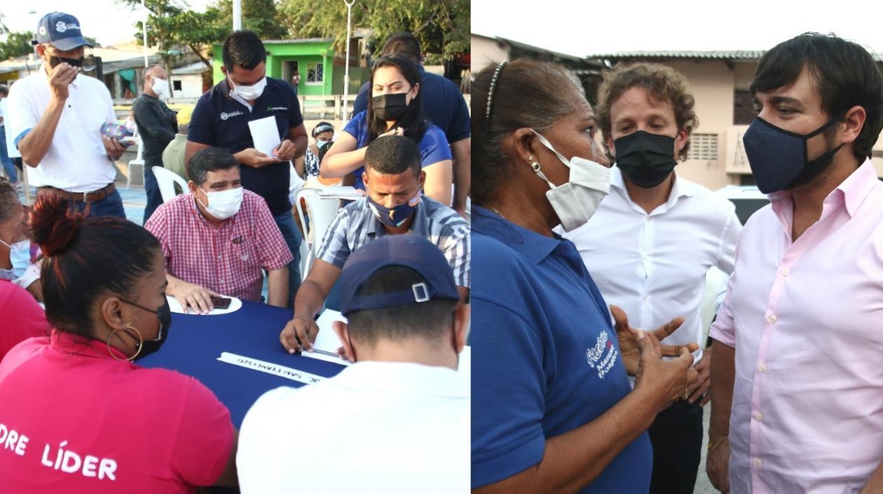 El alcalde Jaime Pumarejo, izquierda, conversa con una residente del barrio El Bosque, en la sesión de trabajo