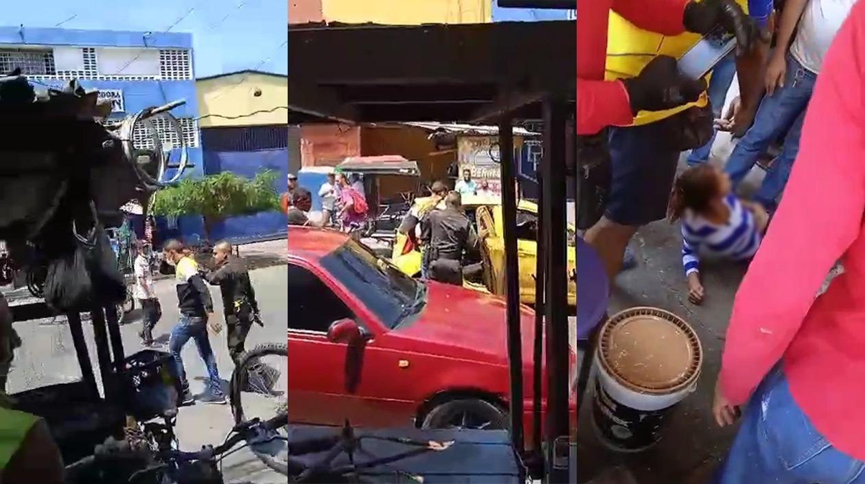 Momento en que el policía se lleva al presunto delincuente y la adolescente quedó herida en el lugar. 