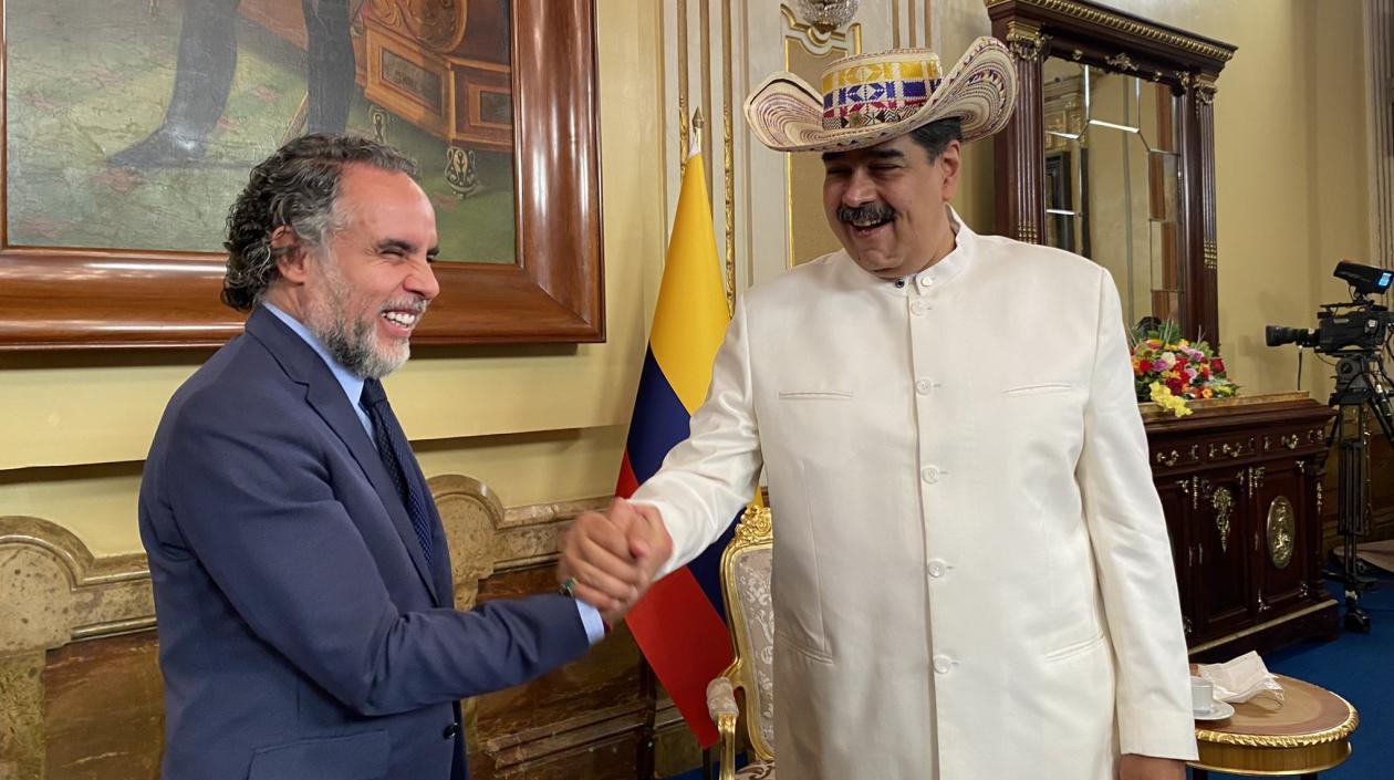 Armando Benedetti y Nicolás Maduro.