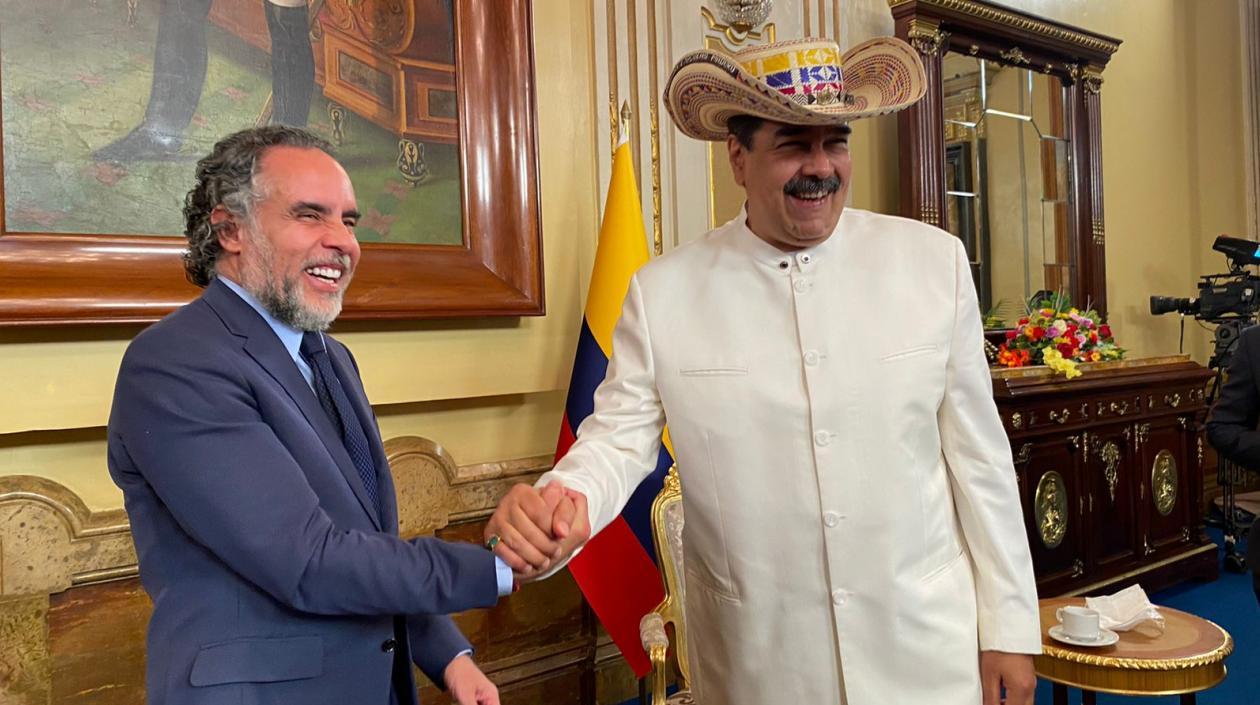Armando Benedetti y Nicolás Maduro.