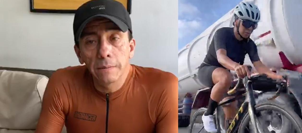 El directivo César Penagos y un carro-tanque pasando cerca de un ciclista.