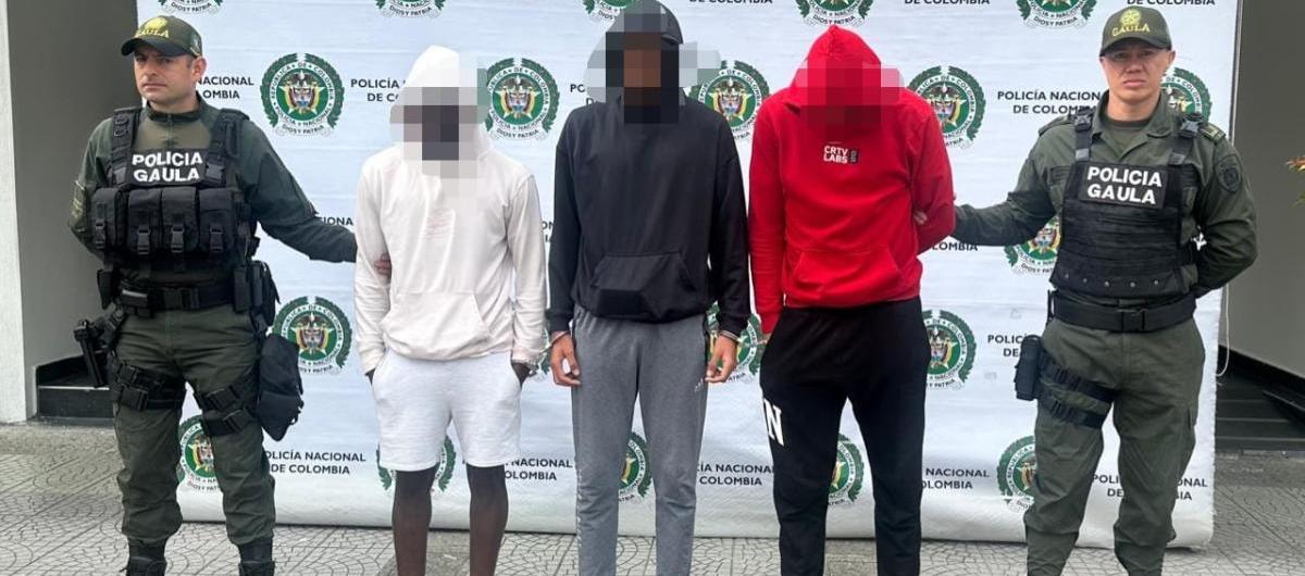 Los tres jugadores del Once Caldas tras ser capturados.  