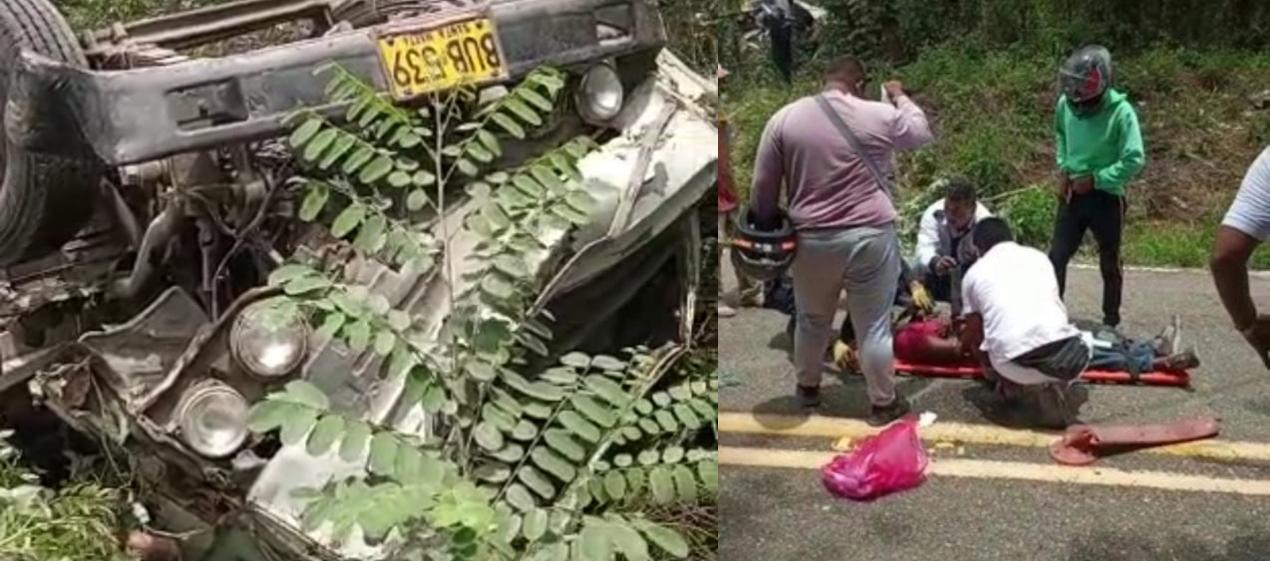 Camión que cayó al abismo y el herido cuando era auxiliado. 