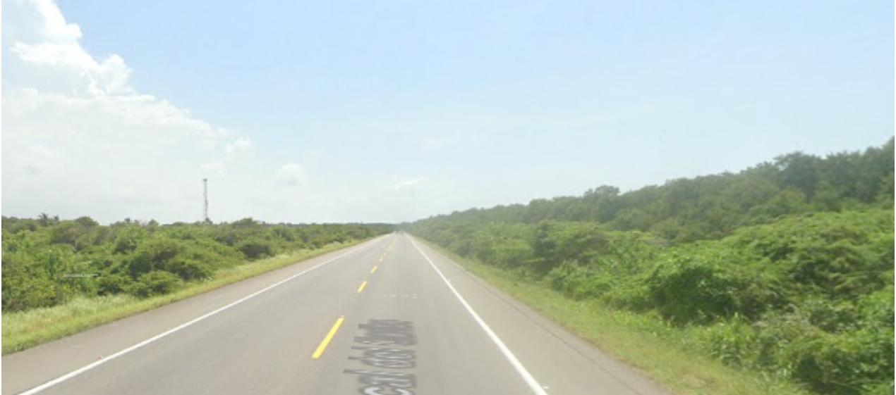La mujer y sus dos compañeros de trabajo fueron retenidos por un tiempo en la vía a Santa Marta. 
