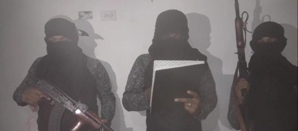 Los encapuchados capturados.