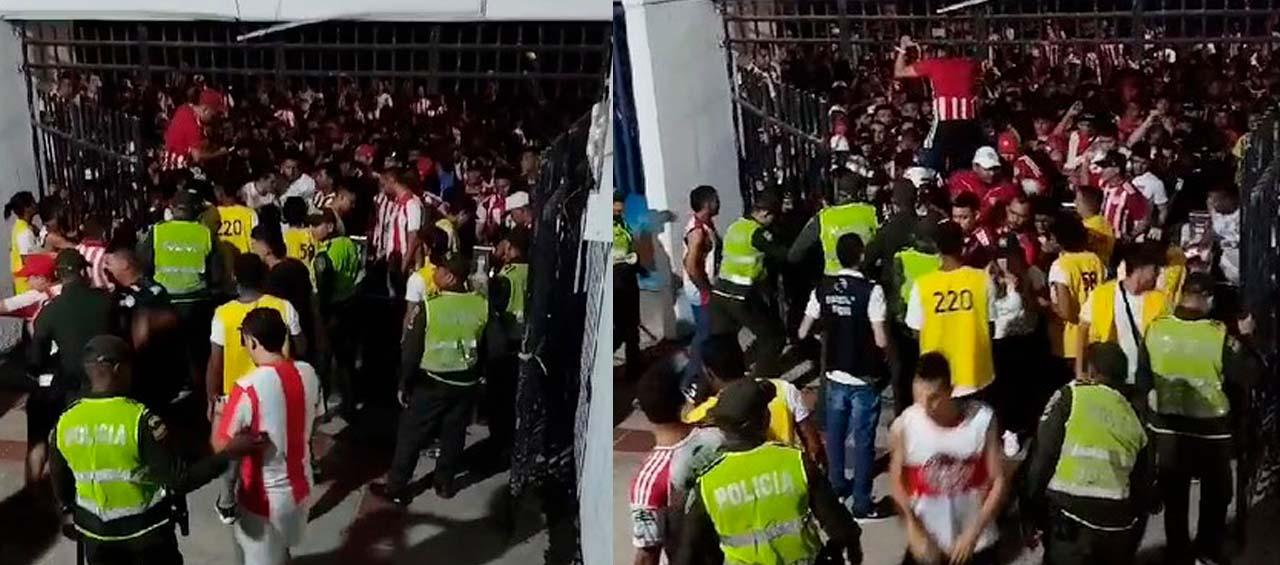 Enfrentamiento entre hinchas del Junior.