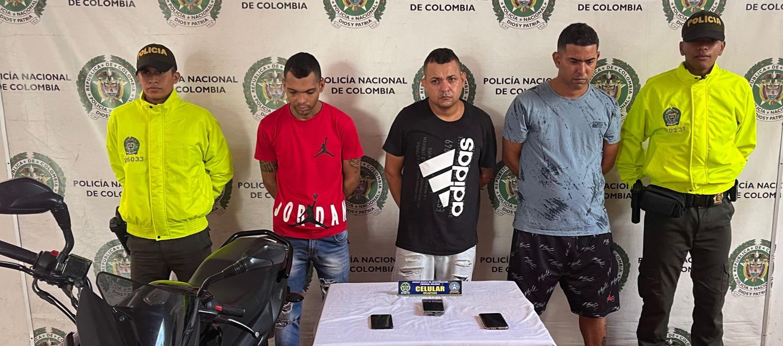 Los tres capturados.