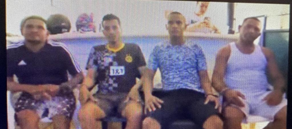 Los cuatro imputados durante la audiencia  virtual de este viernes. 