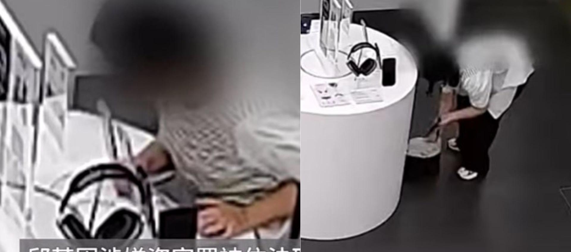 Mujer en el establecimiento robando el teléfono. 