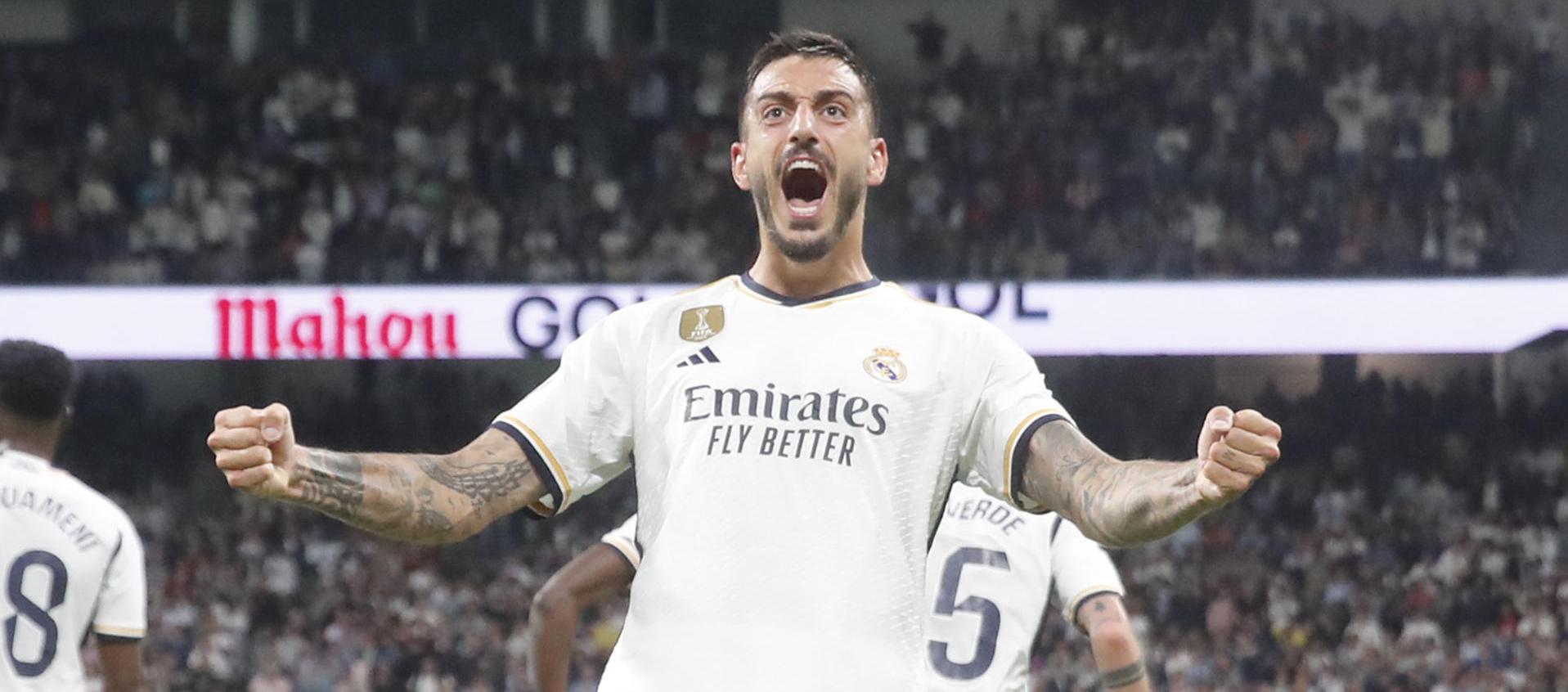 El delantero del Real Madrid, Joselu, celebra el segundo gol de su equipo.