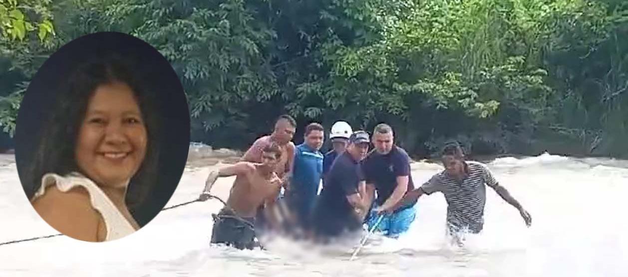María López en momentos en que era rescatada del río Guatapurí